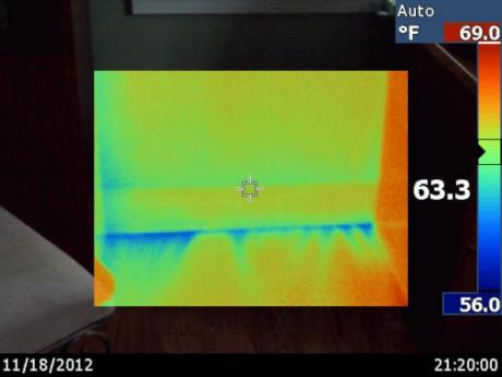 Infrared Camera Image of Air Leaks Where the Wall Meets the Floor